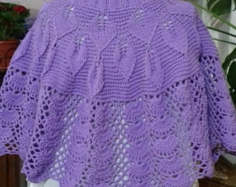 Handknit cape with crochet lace