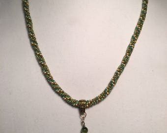 Hand beaded green and gold necklace