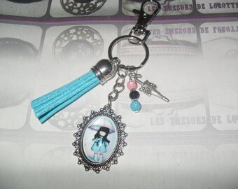 Little girl with umbrella. Jewelry bag or key ring personalized