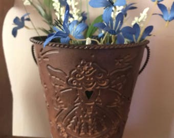 Angelic metal bucket