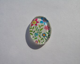 Cabochon 18 X 13 mm oval with a geometric image
