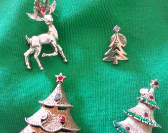Vintage Christmas brooches, Reindeer, and 3 Christmas trees. Gold time.