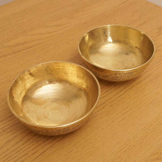 Two heavy solid brass small bowls / dishes / plates floral