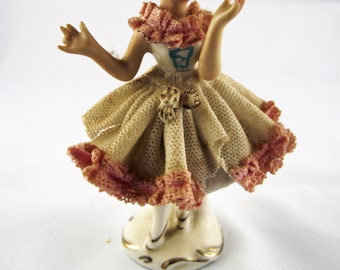 Old porcelain figure, about 7.5 cm high