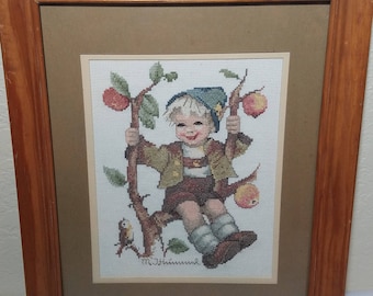 Finished counted cross stitch "Boy in a Apple Tree" framed and matted