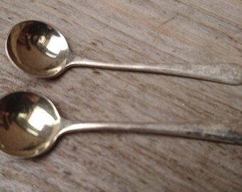 Two vintage sterling silver mustard spoons