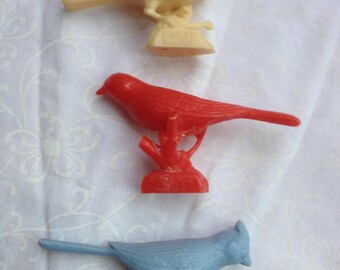 Three vintage plastic birds