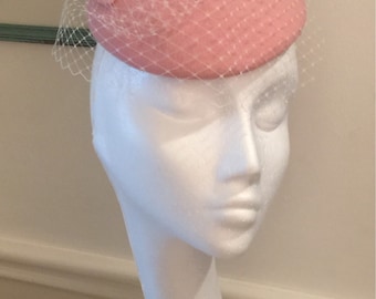 Pink wool felt button hat / fascinator with twirl and veiling