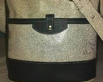 Genuine ostrich print leather purse.