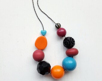 carnival necklace - remixed vintage beads - bold, contrasting colors - black, magenta, turquoise, orange