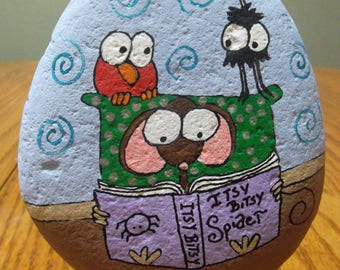 Hand painted rock Mouse reading to friends