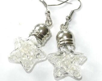 Glass filled with clear rhinestone star earrings