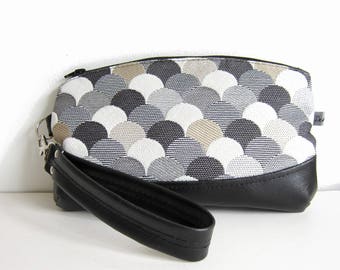 Hand clutch with removable strap, black faux leather and jacquard fabric