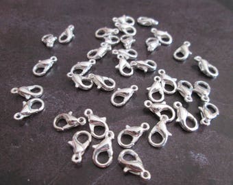 set of 10 silver snap mat 12 x 7 mm