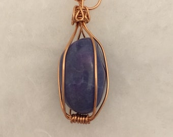 Wire wrapped purple stone pendant