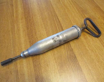 Vintage Alemite Grease push type gun