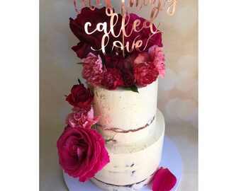 This thing called love cake topper