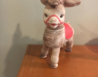 Vintage the sun rubber donkey with marble feet