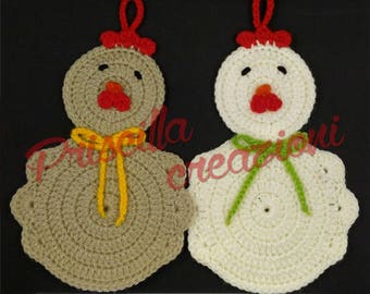 Pair of handmade pot holders made from crochet in the shape of a hen