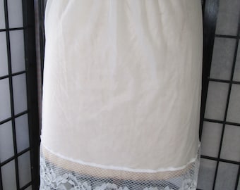 vintage half slip above the knee with lace detail at hem