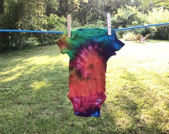 Rainbow tie dye baby onesie.