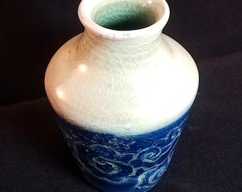 Delicate wood fired porcelain bud vase