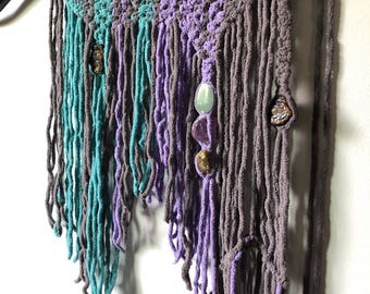 Handmade industrial boho macrame wall hanging on a shovel with crystals