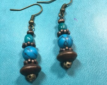Turquoise and copper dangle drop earrings.
