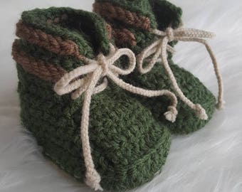 Green Baby Boots with Brown Trim and Tan Ties
