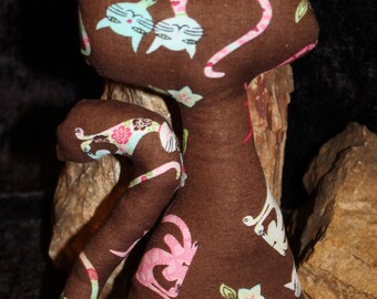 Stuffed aristocat made out of retro fabric