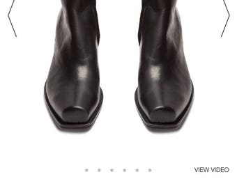 Made to order ankle boots with slanted heels