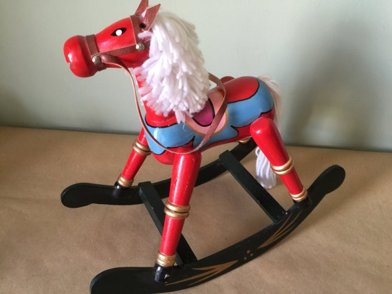 Vintage Red Wooden Rocking Horse with Yarn Mane and Tail.