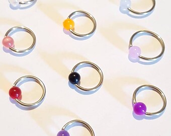 Anneau captif de perle. Ventre de cerceau. nombril. Septum. Cartilage