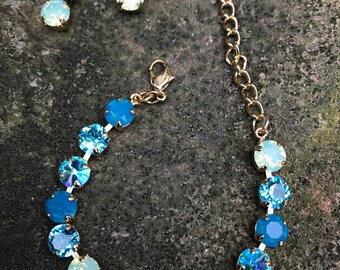 8mm swarovski carribean blue bracelet and earrings