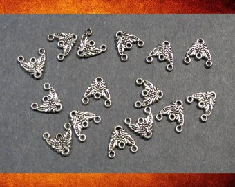 Components - 15 Bali-style silver four loop connectors for jewelry making. #FIND-006