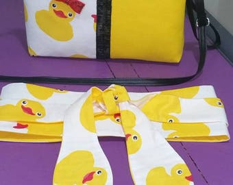 reversible fabric tie belt. ducks on one side and yellow on the other. Total length around 217 cm. to match