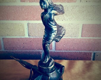 Girl in dress mascot