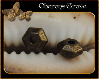 40 Metal beads 3x5mm bronze