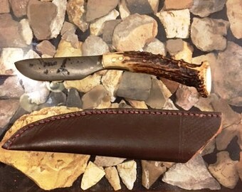 Hand forged cable with antler handle.