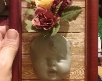Framed Vintage Doll Head with Roses
