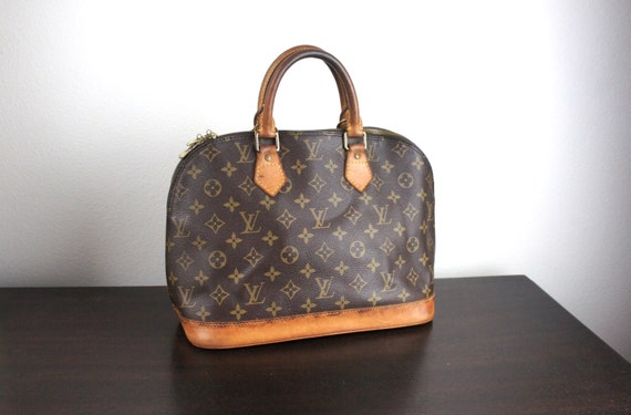 How To Spot A Fake Louis Vuitton Alma Bag | Jaguar Clubs of North America