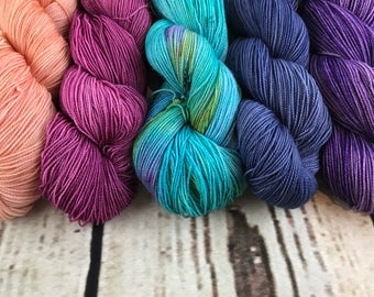 Joji' MKAL, Starting Point Mystery Wrap, Caribbean Life
