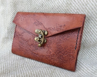 Leather covered Moleskine pocket notebook