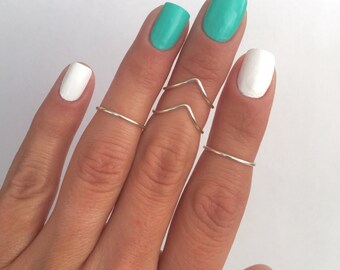 4 Midi Rings in Silver, Chevron and Simple Band Midi Rings. Wear these non tarnish mid knuckle stacking rings in many combinations!