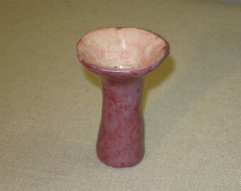 Miniature burgundy wash vase with narrow base and fanned out top design