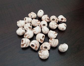 Ivory howlite skull beads 26 pieces