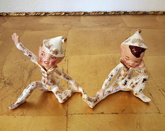 Pair Of Pixie Elfs or Elves in Pajamas Ceramic Figurines Possibly Dancing Or Stretching Pixies