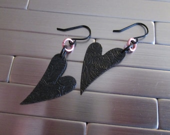 Asymmetric Black Heart Earrings.