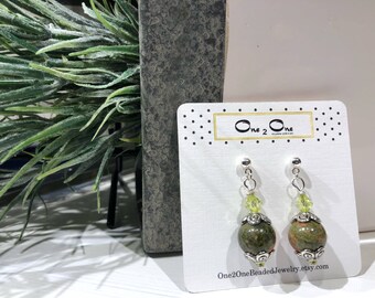 Green, coral, and silver earrings