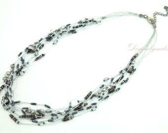 Black freshwater pearl,onyx on silk necklace.